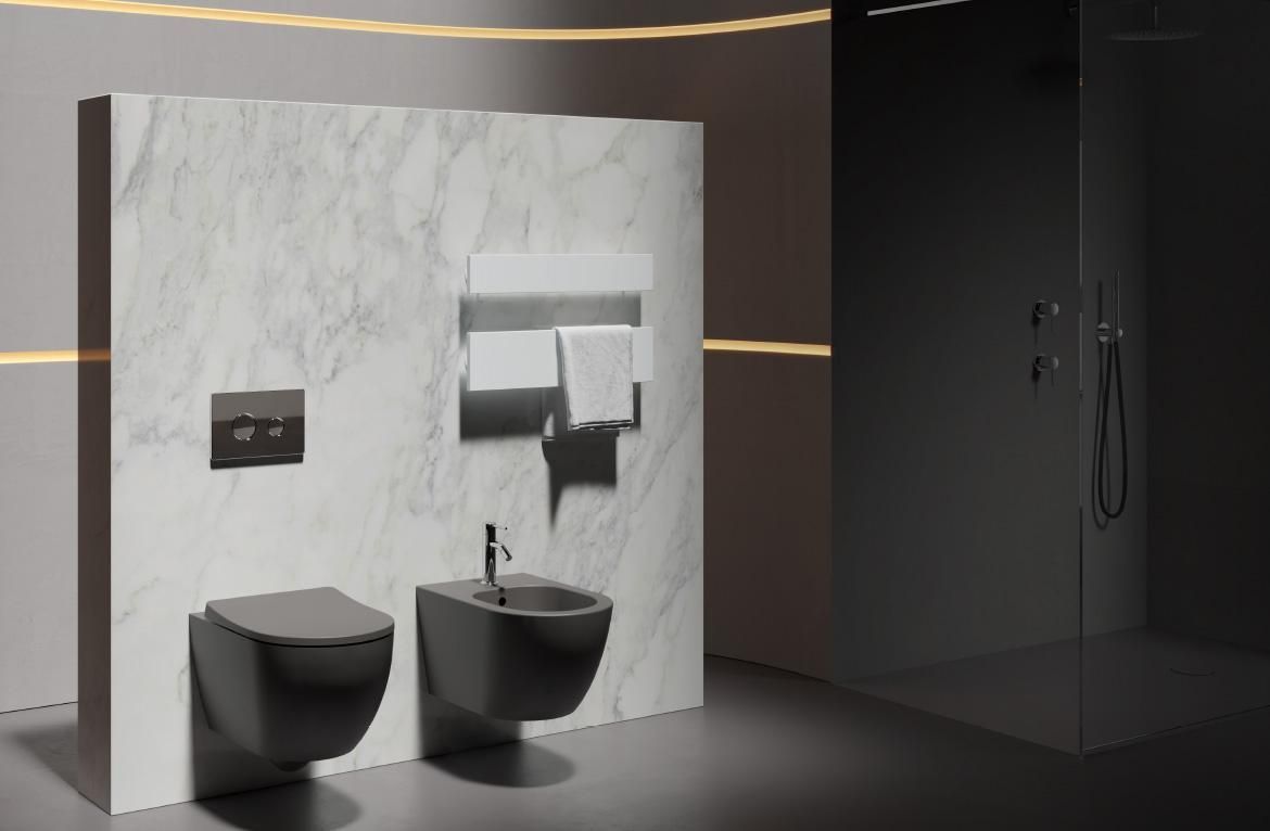 Un bagno con WC, bidet e doccia.