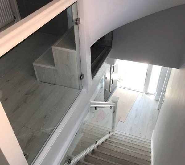 We install glass balustrades which are cut to suit any size. Glass on stairs in Brentwood. Glass staircases designed to suit your home in Shenfield. We also install glass banisters in Essex and Leigh on sea.  We can also provide Toughened glass for your stairs in Hornchurch. These can be installed by a glass installer near me. For a bespoke look to your glass stairwell in Upminster. Shaped glass balustrades can be made to order in Romford or Chigwell and a usual lead time is 7 working days.