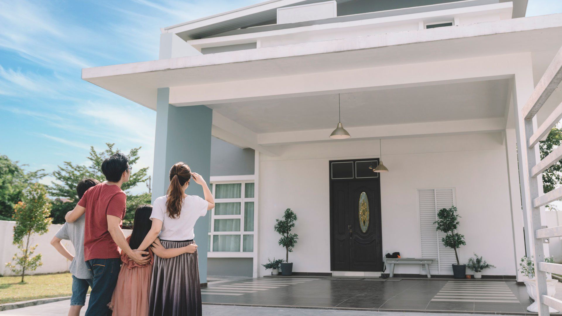 Family Looking at Their New House — Statesville, NC — Lentz Septic Tank Service