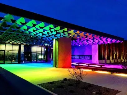 A building with a rainbow of lights on it
