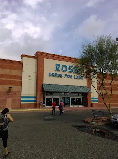People are walking in front of a ross dress for less store