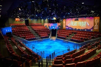 An empty theatre with a sign that says freaky friday