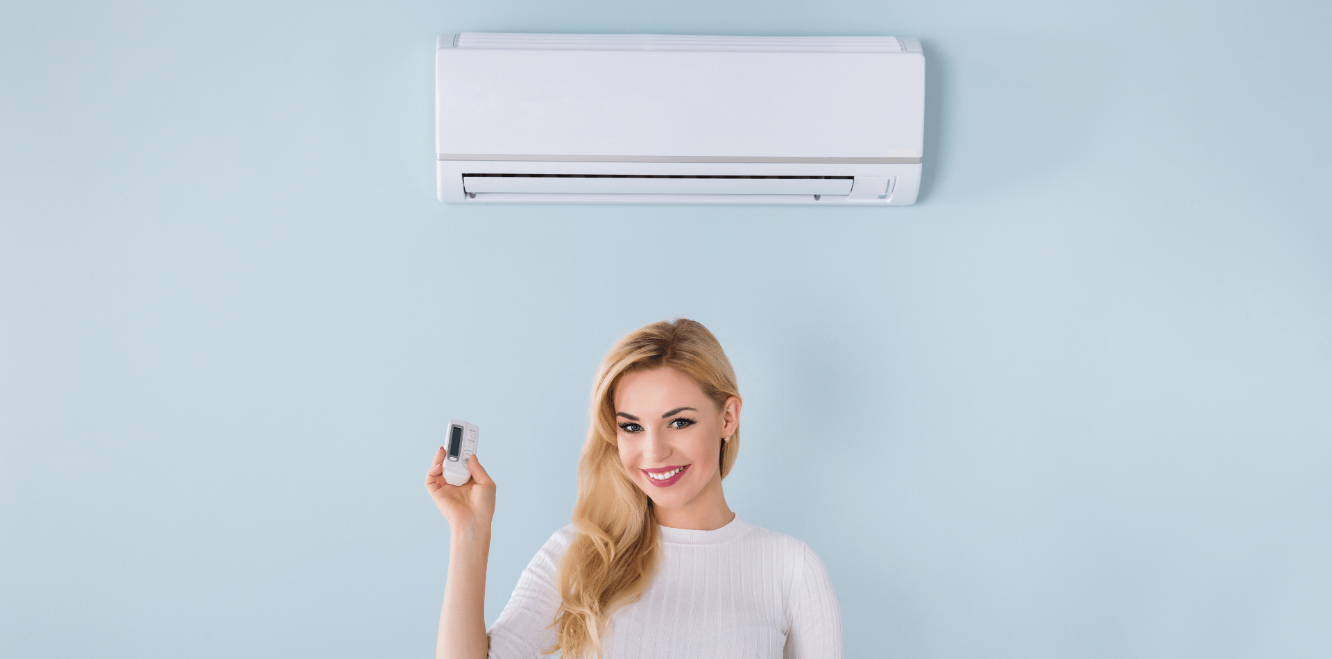 A girl using a split system air conditioner