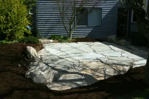A house with a patio in front of it