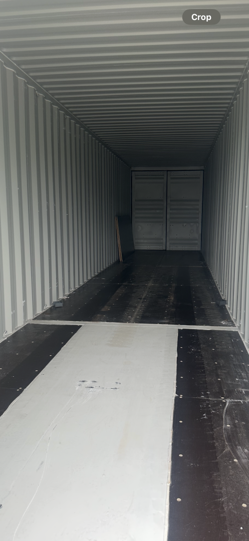 Inside a shipping container, showing the interior walls and floor.— Cairns Budget Storage In Mount Sheridan, QLD