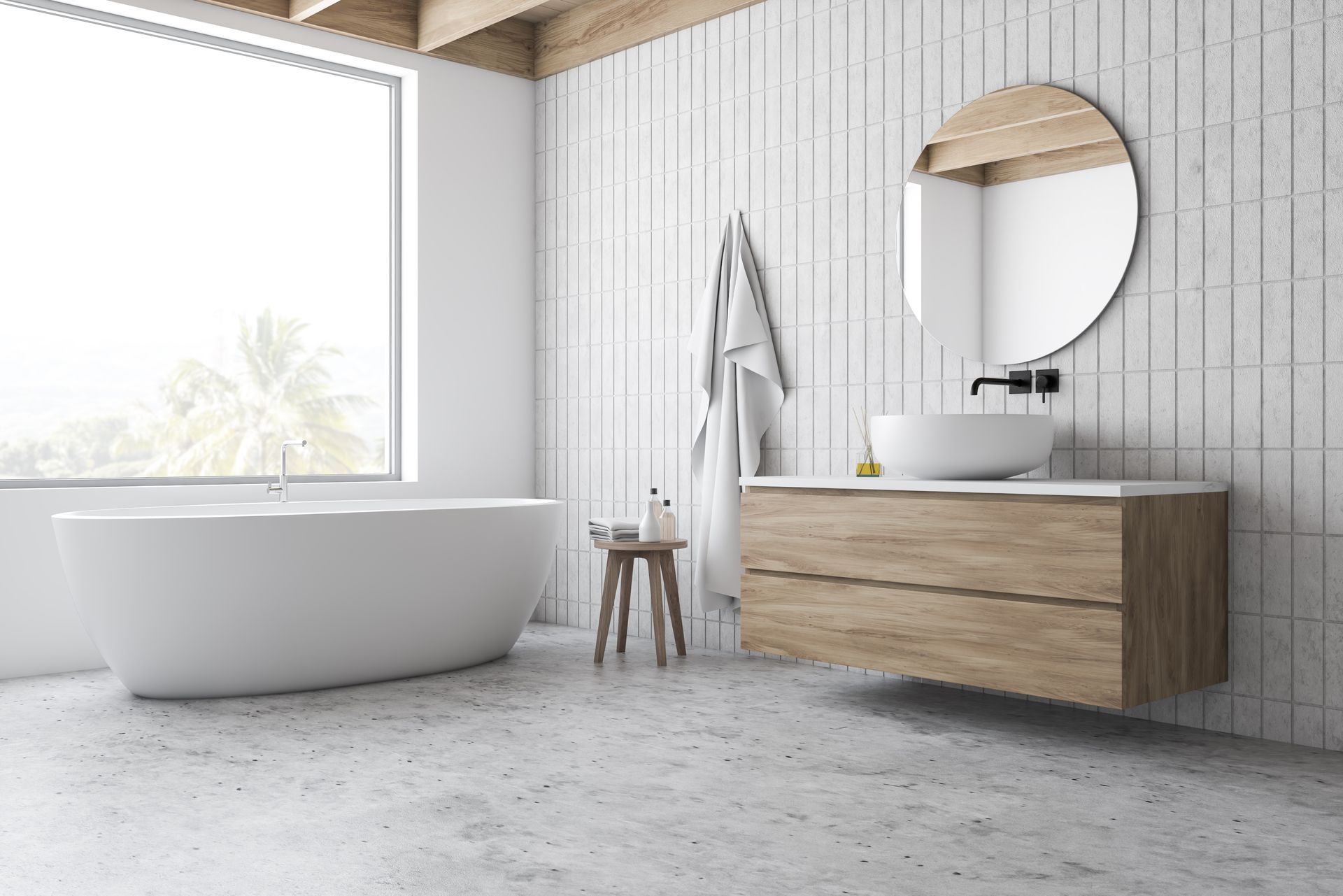 A bathroom with a tub , sink , mirror and window.