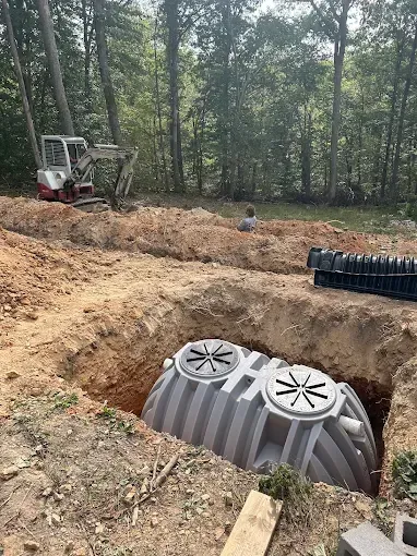 Hands in blue gloves on solar panels.
