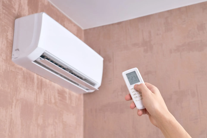 Technician diagnosing an air conditioning system that is not working at a home in Omaha, NE 
