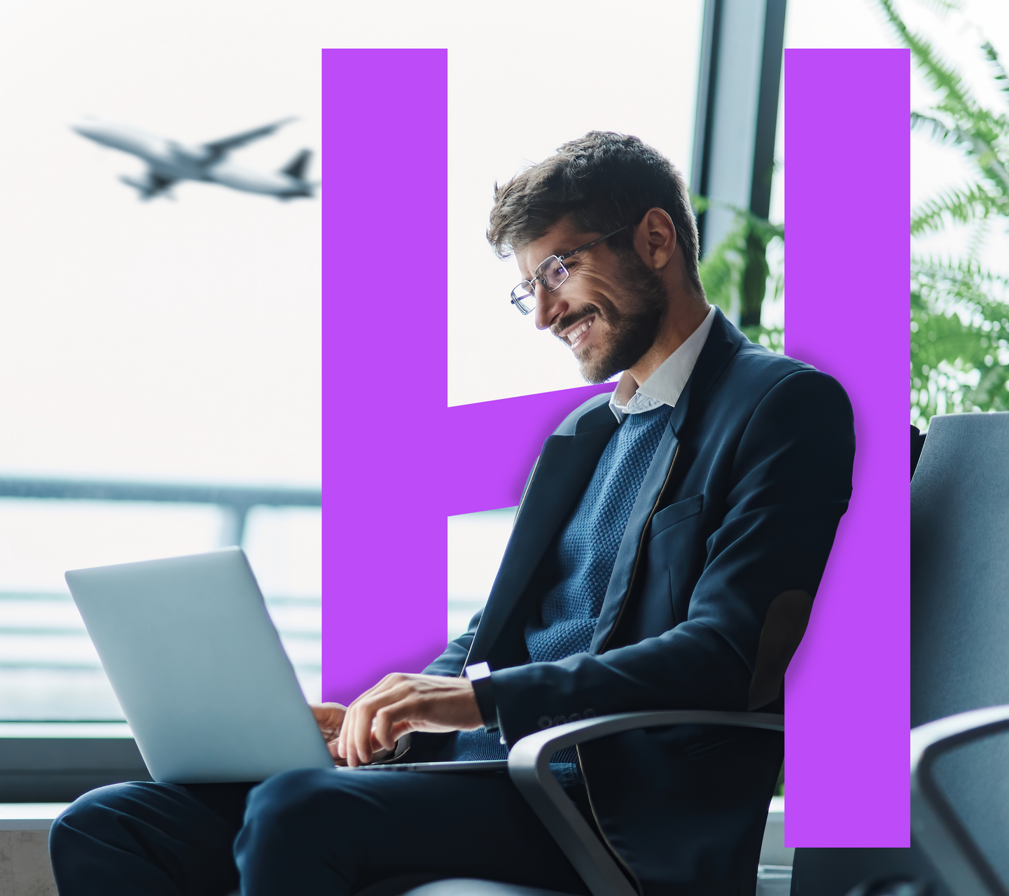 Man in suit working on laptop near window, with plane and purple 