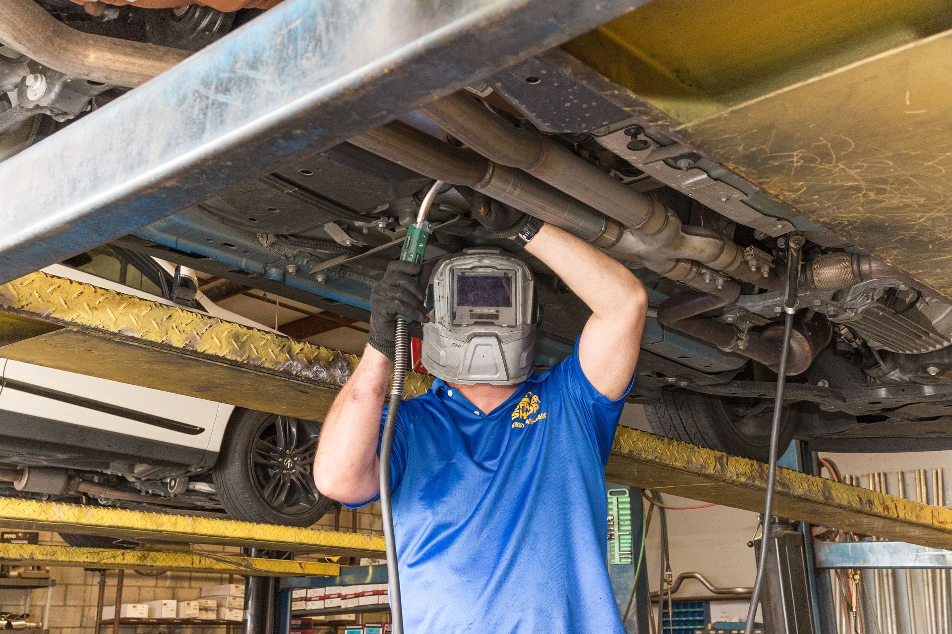 Welding exhaust under car