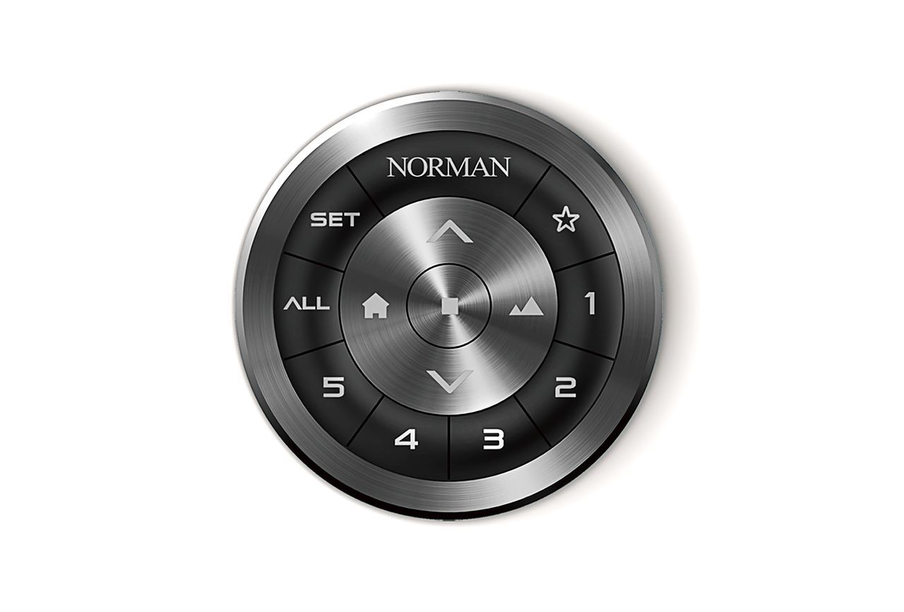 A circular Norman smart remote control with touch buttons for channels, settings, and up/down movement.
