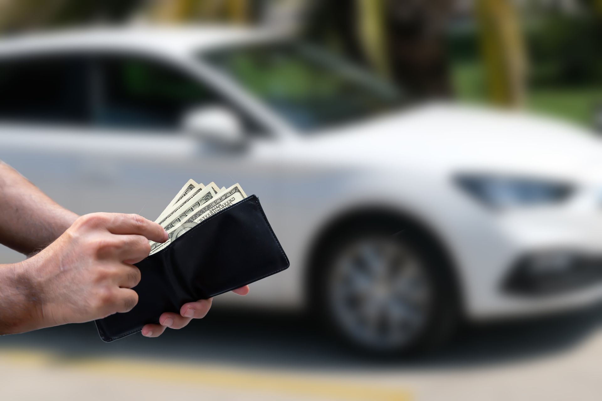 Man Paying the Services – Canton, OH – Mike Spencer Towing