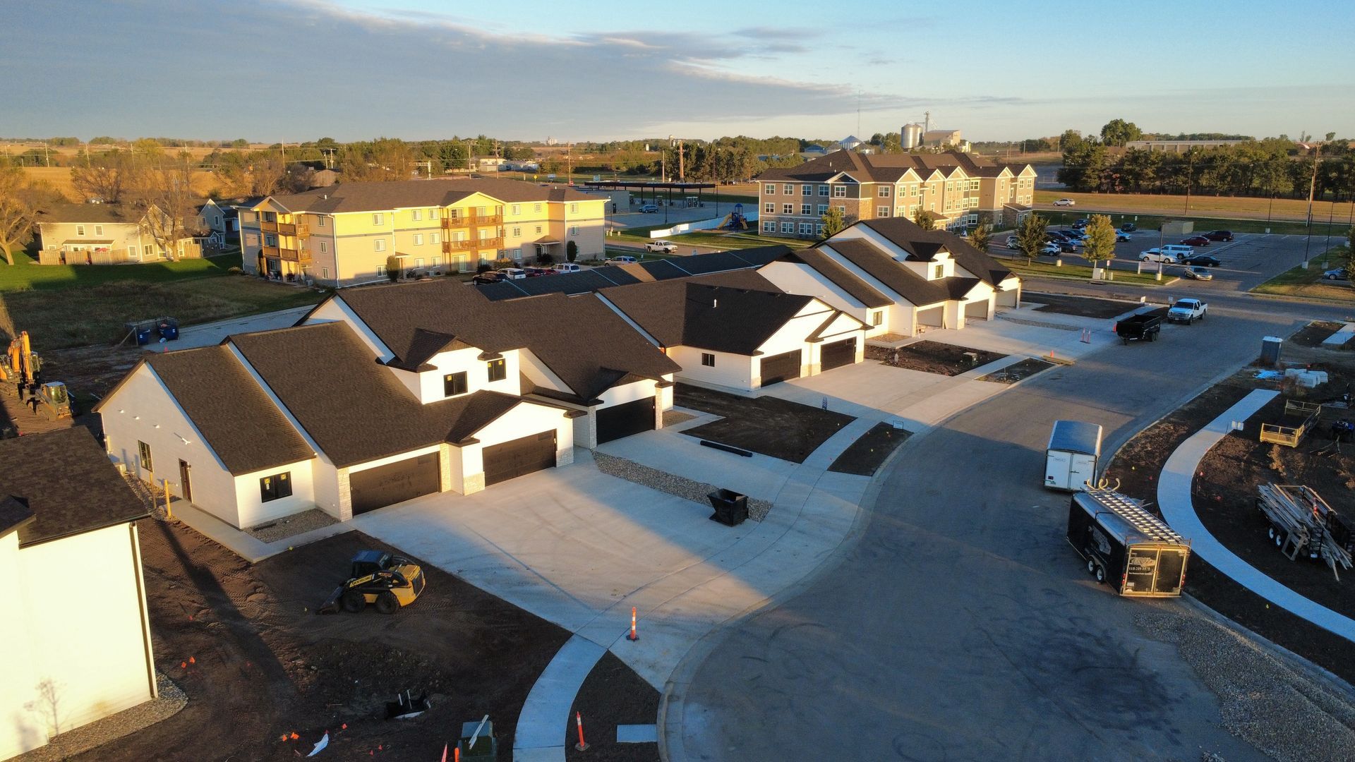 A bathroom with a sink , mirror and window