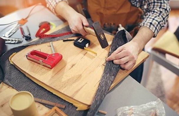 Upholstery — Man During Upholstery in Freehold, NJ