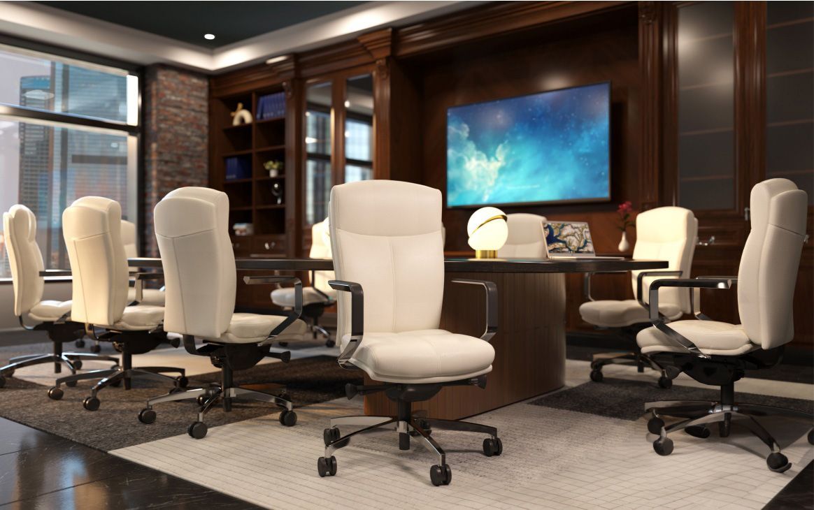 Conference room with a large screen, dark wood furniture, and white leather chairs.
