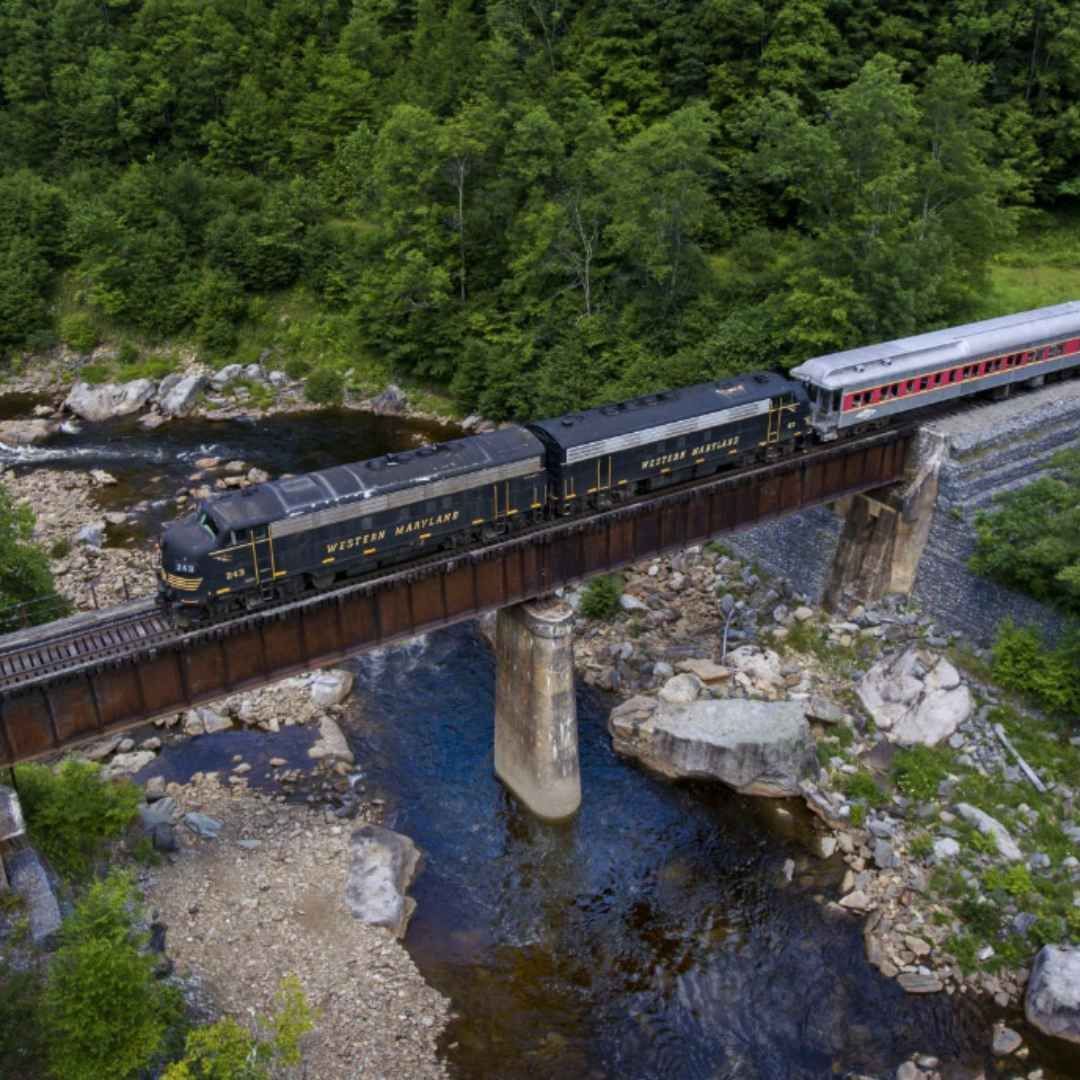 Scenic train running above the river in West Virginia