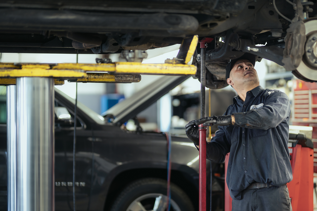 Technician working on a car | Larsen Automotive