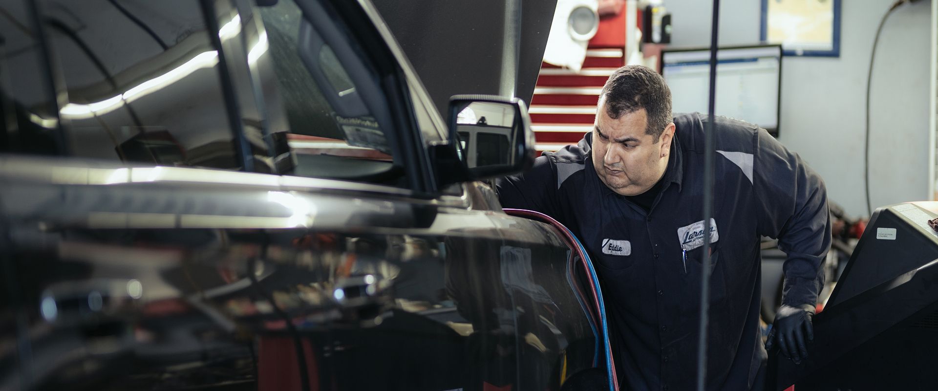 mechanic working | Larsen Automotive Inc