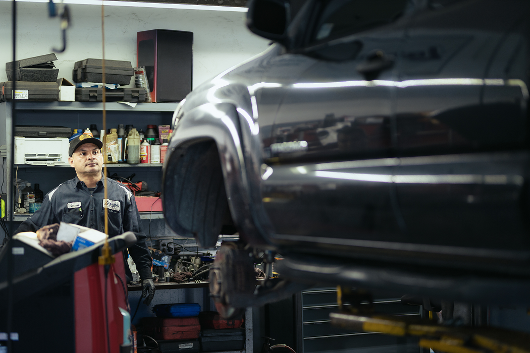 Technician working on a car | Larsen Automotive