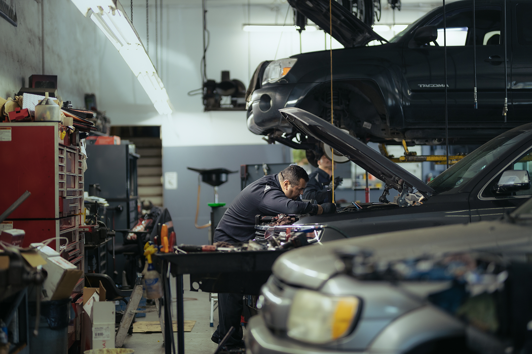 Technician working on a car | Larsen Automotive