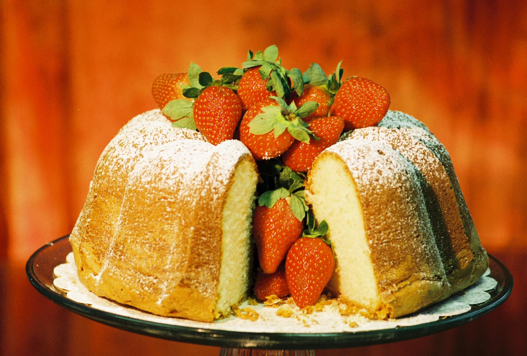 Lemon Cream Cheese Pound Cake garnished with fresh strawberries