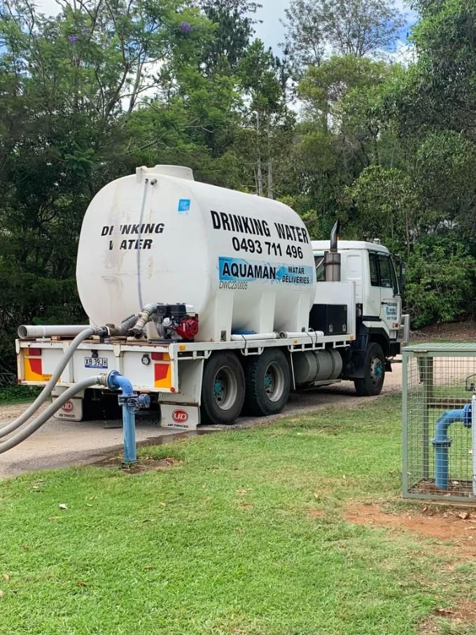 A White Water Truck Is Parked On The Side Of A Road — Aquaman Watàr Deliveries In Bald Knob, QLD