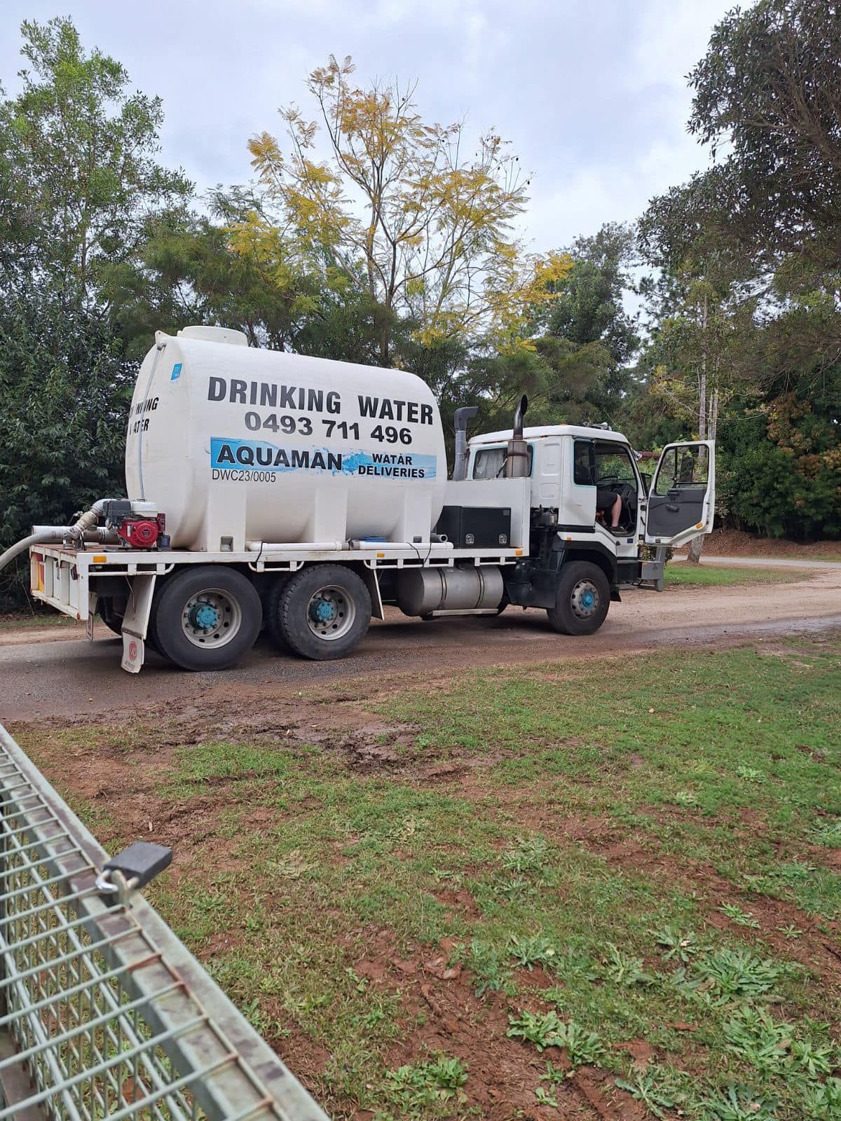 A Drinking Water Truck Is Parked On The Side Of A Dirt Road — Aquaman Watàr Deliveries In Bald Knob, QLD