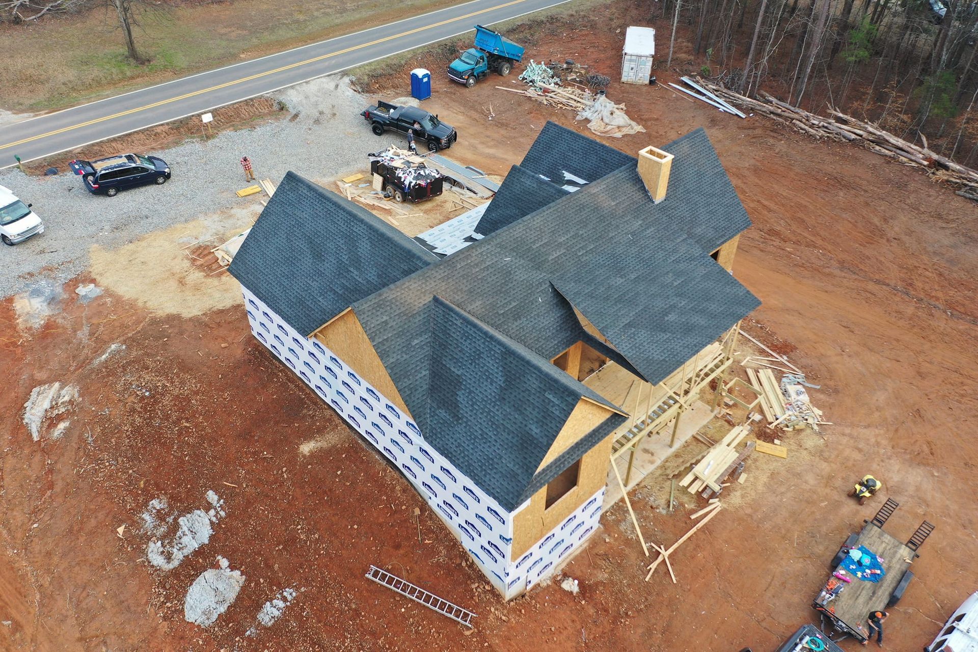 An aerial view of a house that is being built