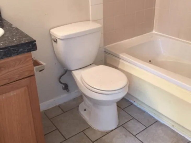 Toilet Bowl With Cover — Anchorage, AK — A Affordable Cleaning By Diane's Service