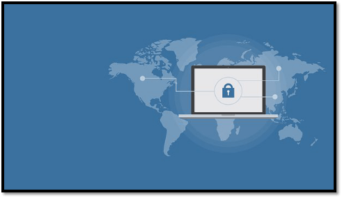 a laptop with a padlock on the screen is sitting in front of a map of the world .