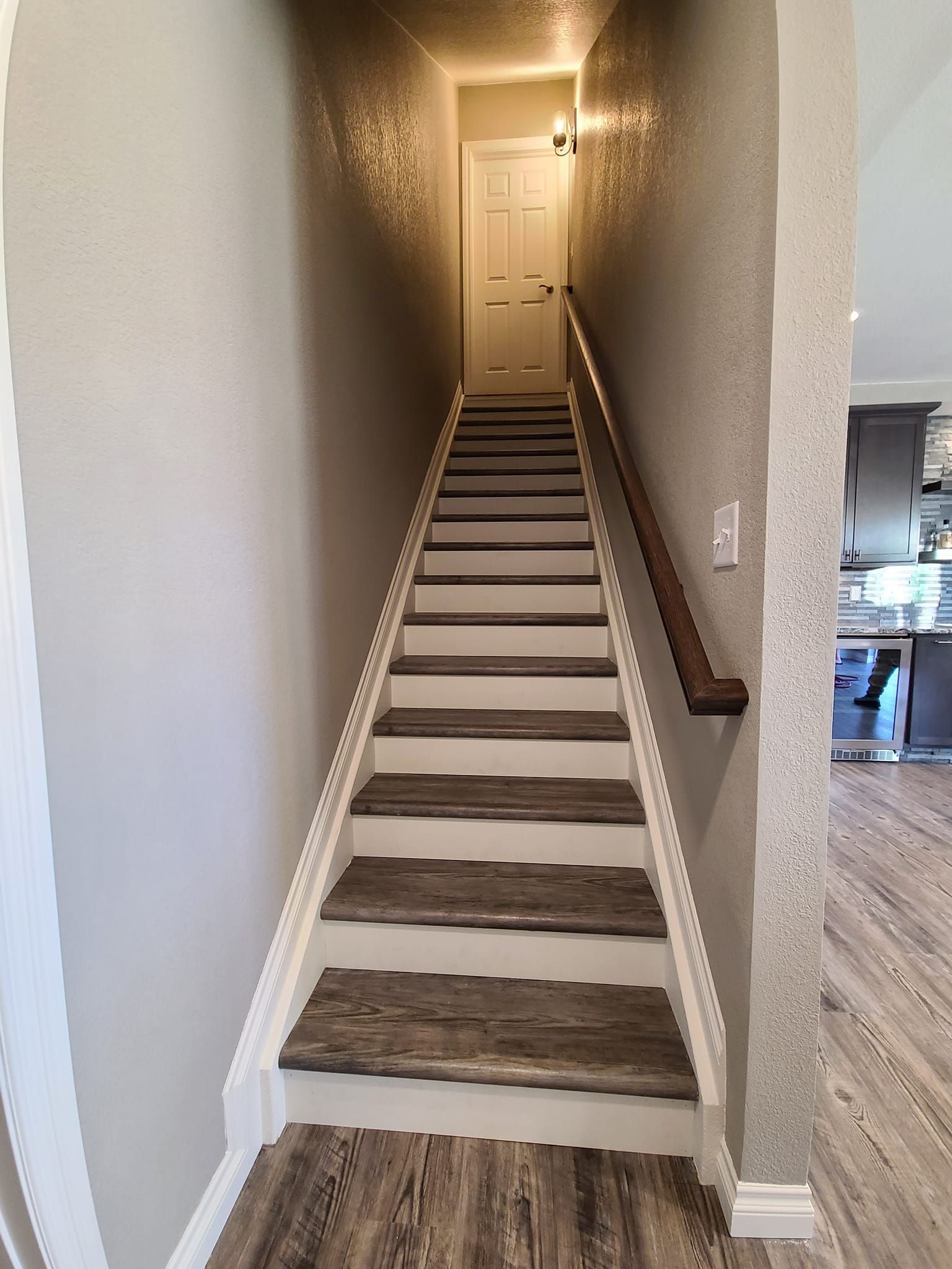 A set of stairs leading up to the second floor of a house.