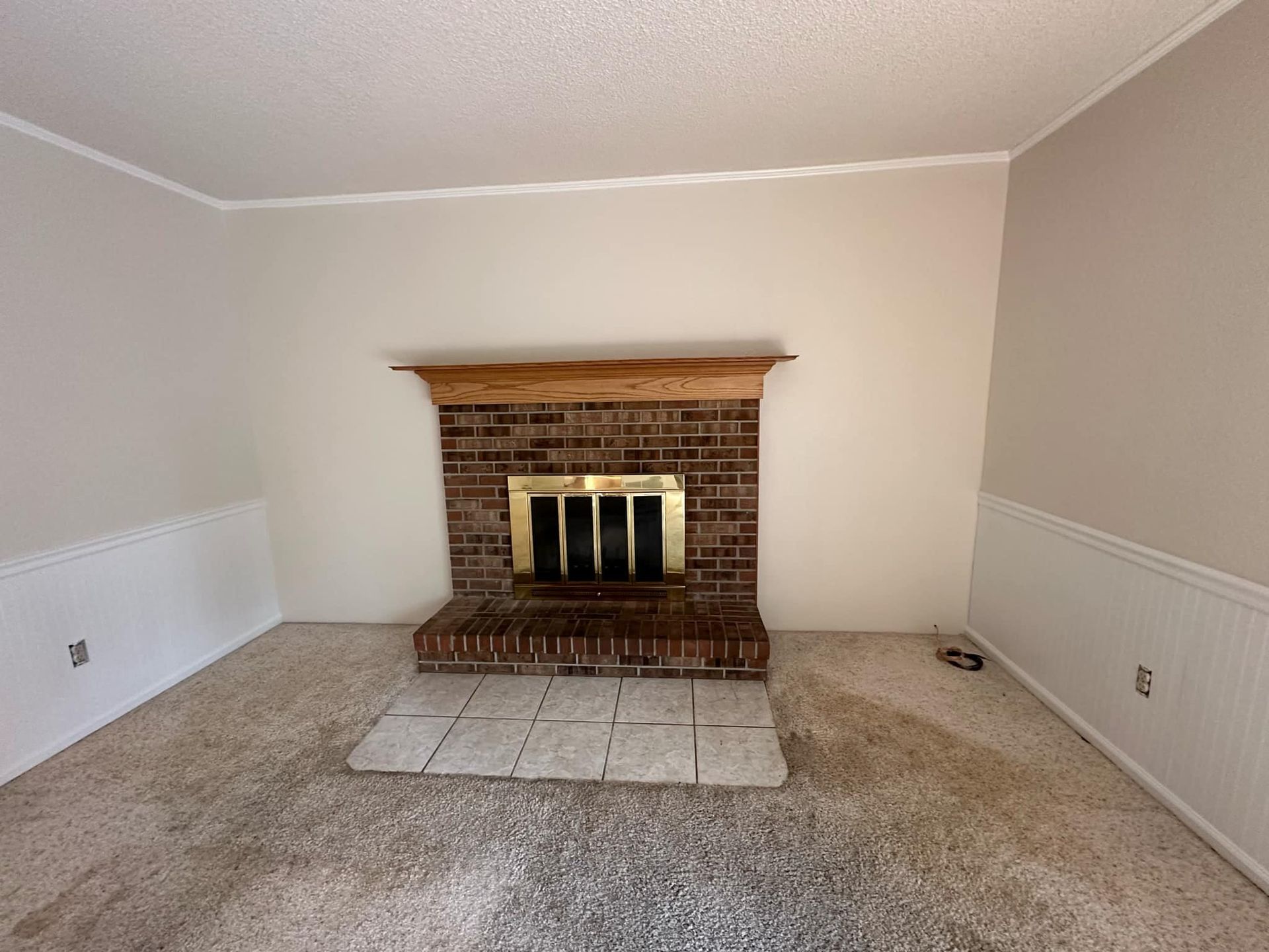 There is a fireplace in the middle of the room.