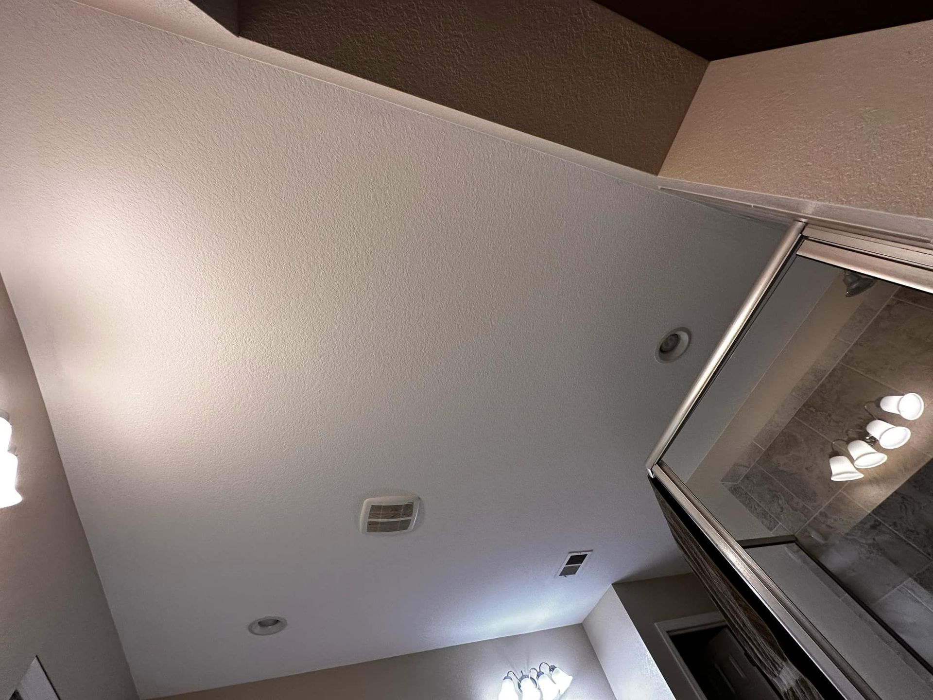 Looking up at the ceiling of a bathroom