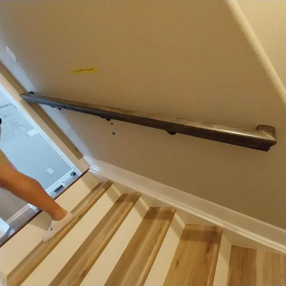 A person is walking down a set of stairs