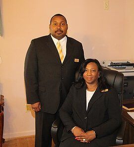 L.M. Pierce Funeral Home, Inc. staff members two people