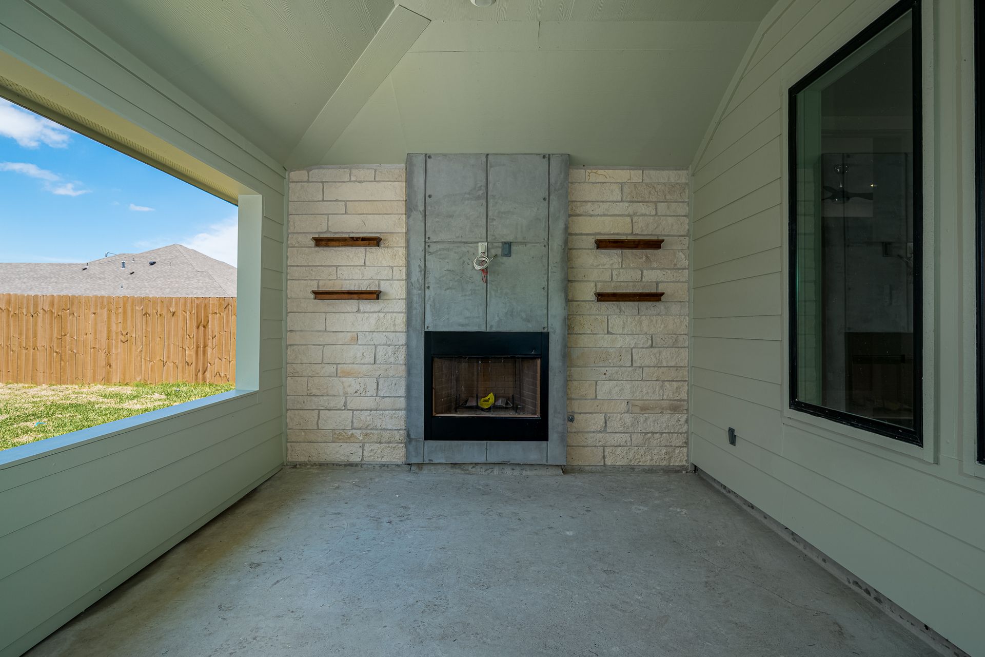 There is a fireplace in the middle of the room.