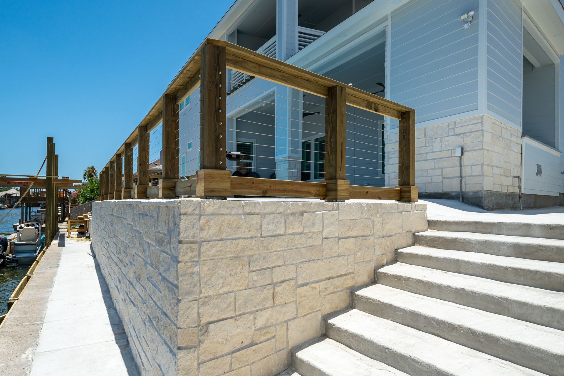 A white house with stairs leading up to it