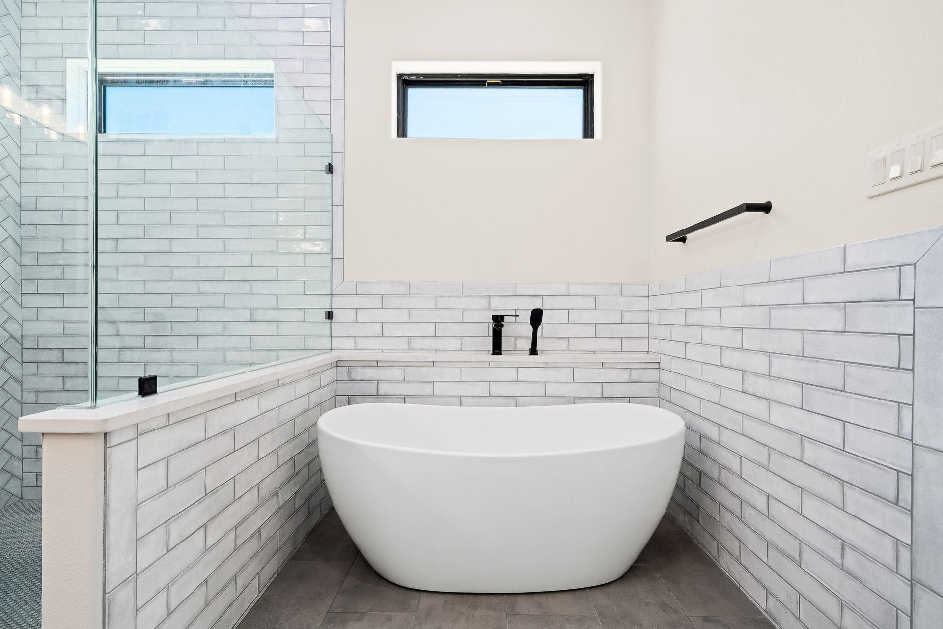 There is a bathtub in the middle of the bathroom.