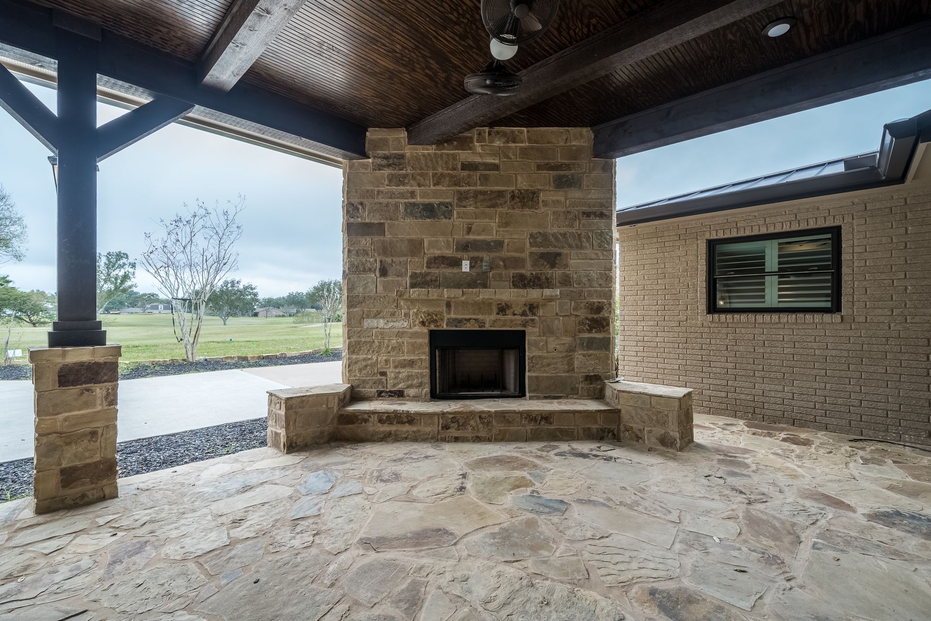 There is a fireplace in the middle of the room.