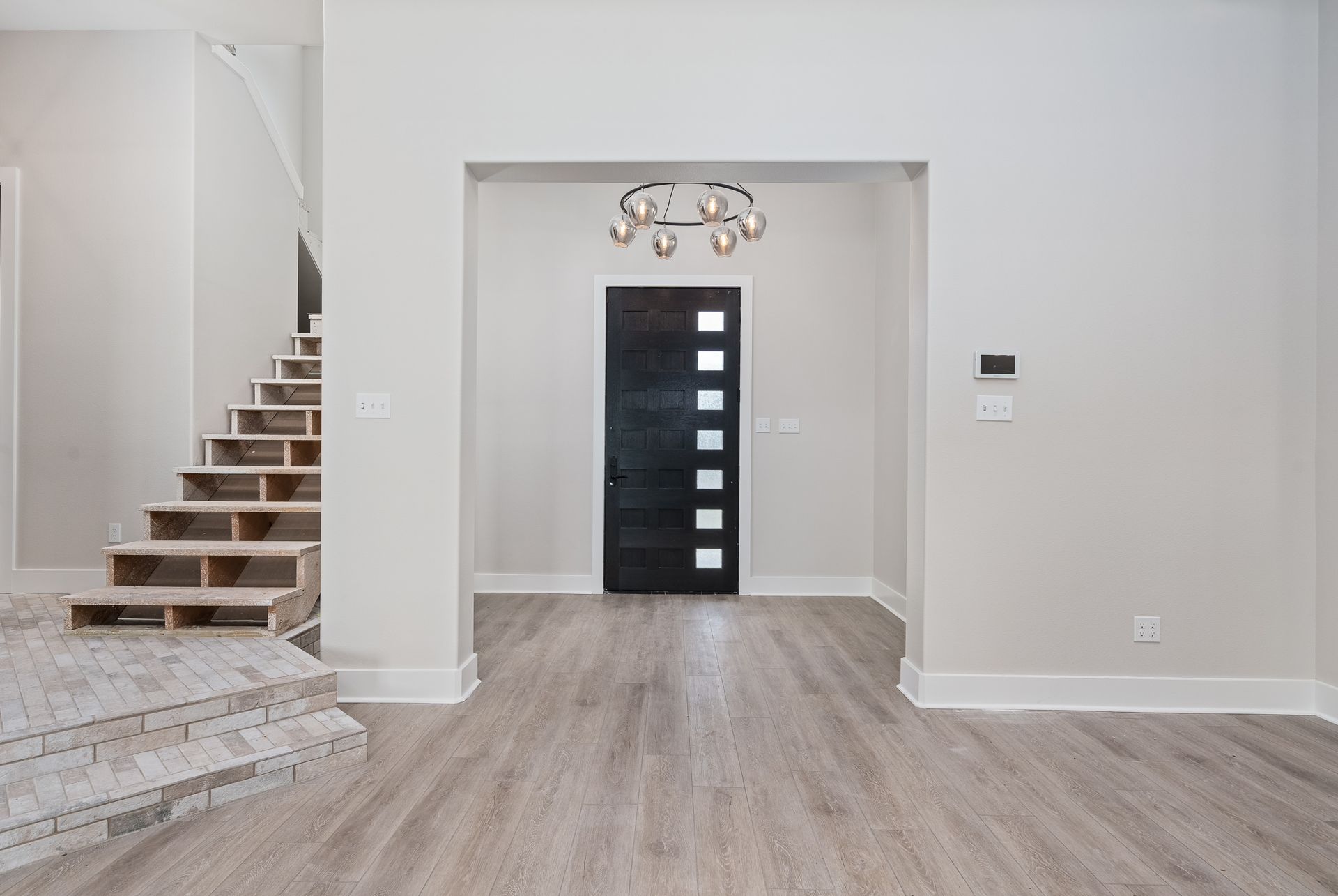 There is a staircase leading up to the second floor of the house.