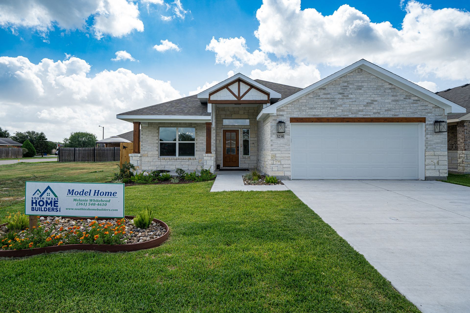 A house with a sign in front of it that says hup