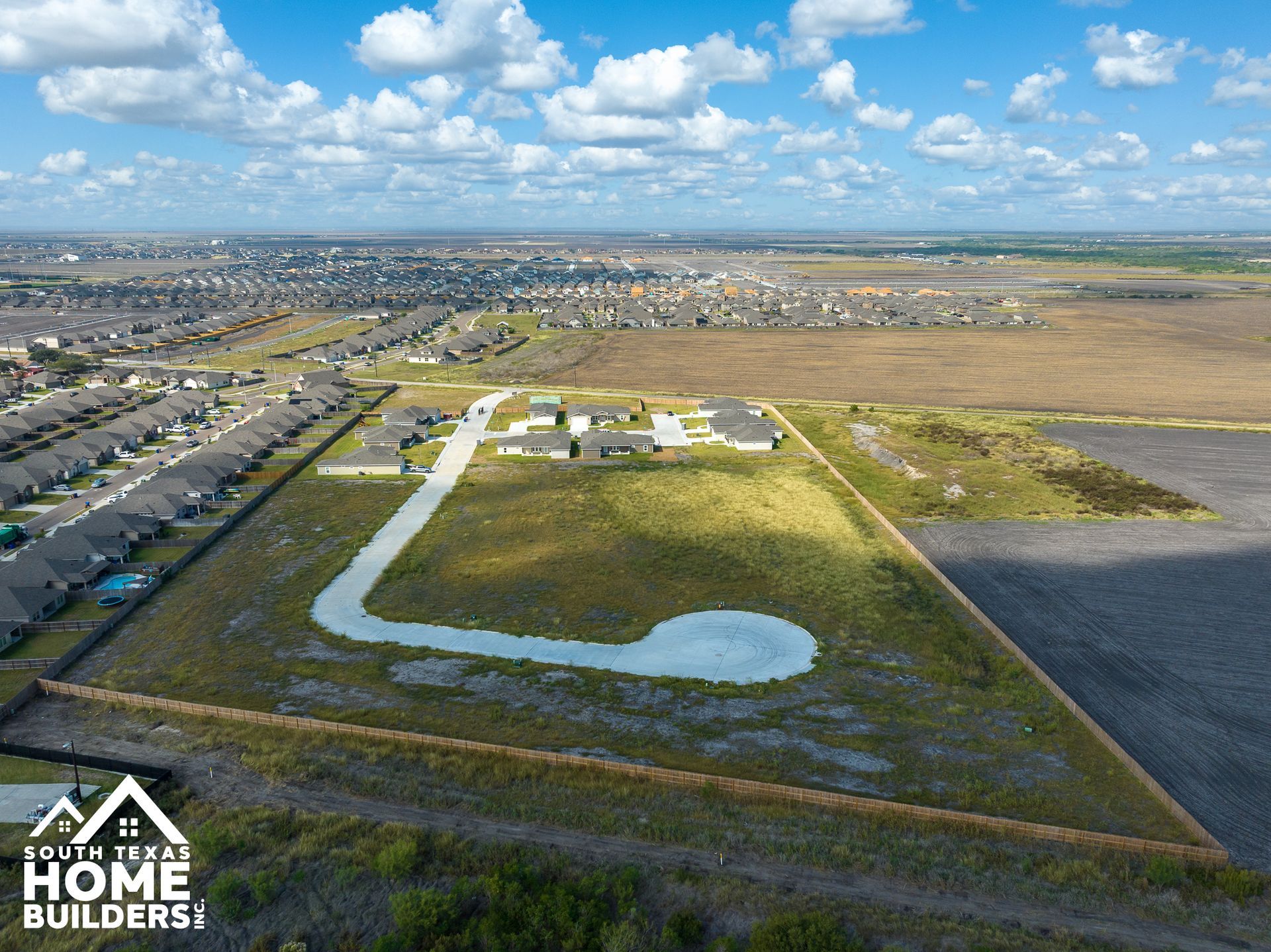 Can of Beyond hard seltzer with a red, orange, and green square design on a green surface.