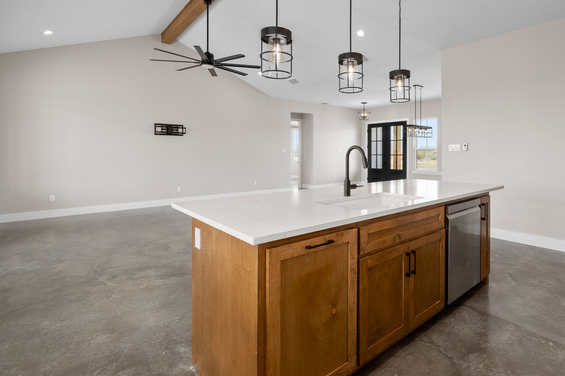 There is a large island in the middle of the kitchen.