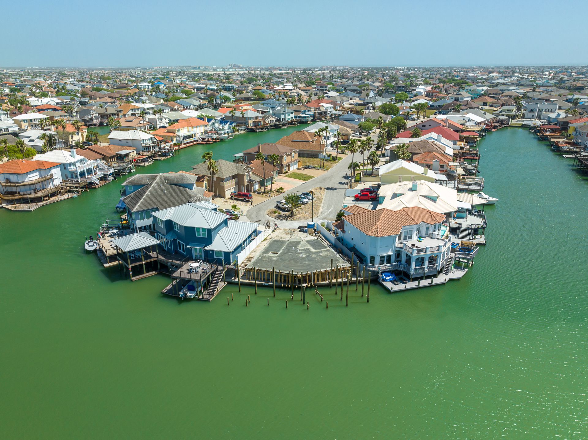 An aerial view of a small island in the middle of a body of water