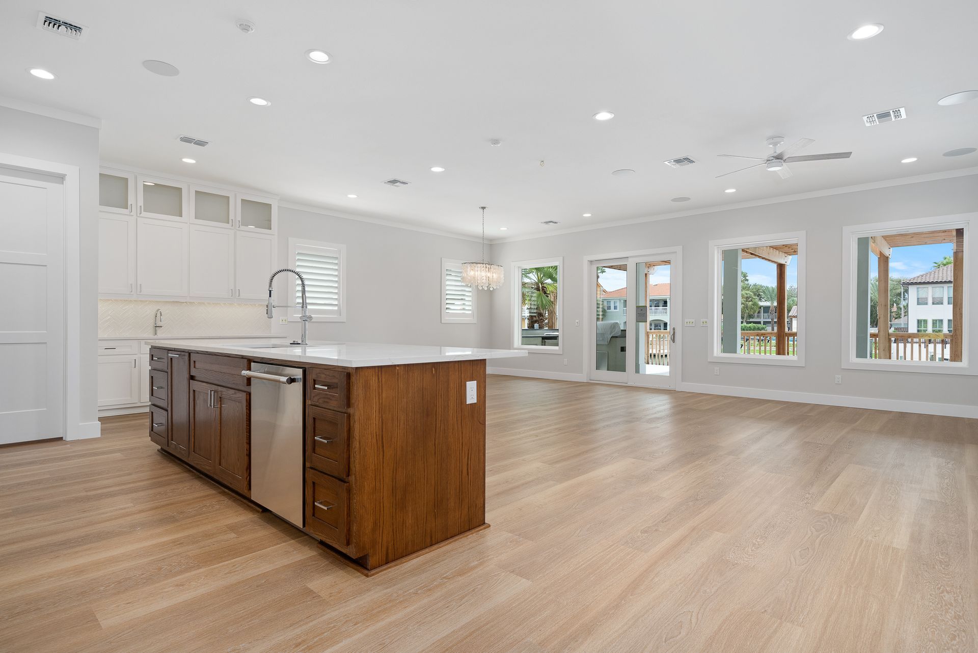 There is a large island in the middle of the kitchen.
