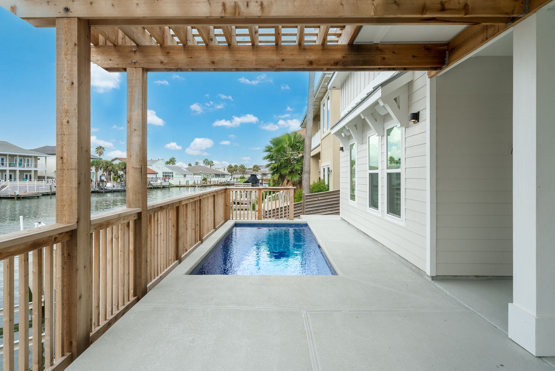 There is a small pool in the middle of the patio.