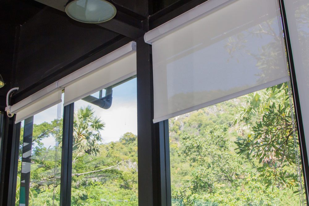 A Room With a Lot of Windows and Blinds on Them — Artizen Curtains in Mooloolaba, QLD