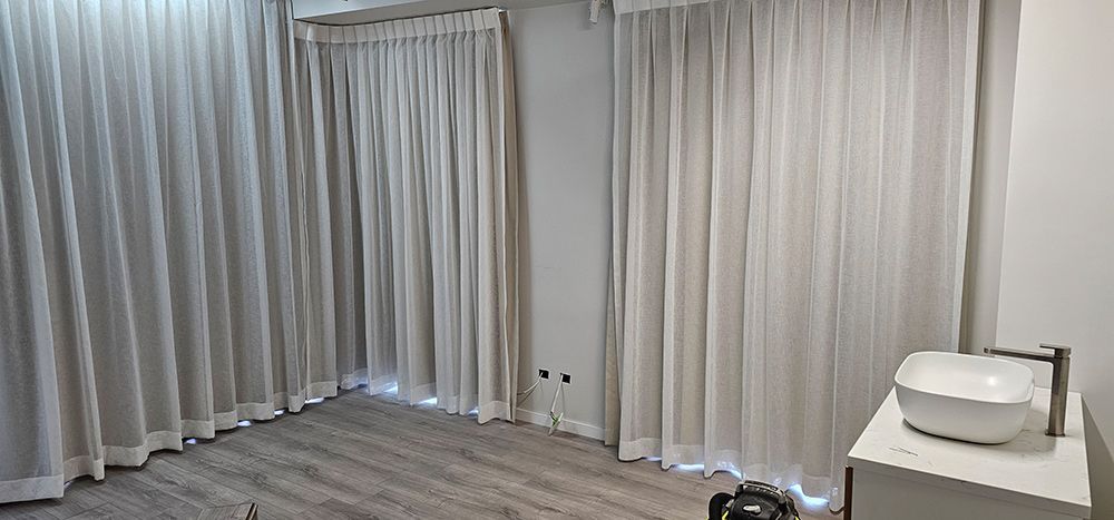 A Bathroom With White Curtains and a Sink — Artizen Curtains in Mooloolaba, QLD