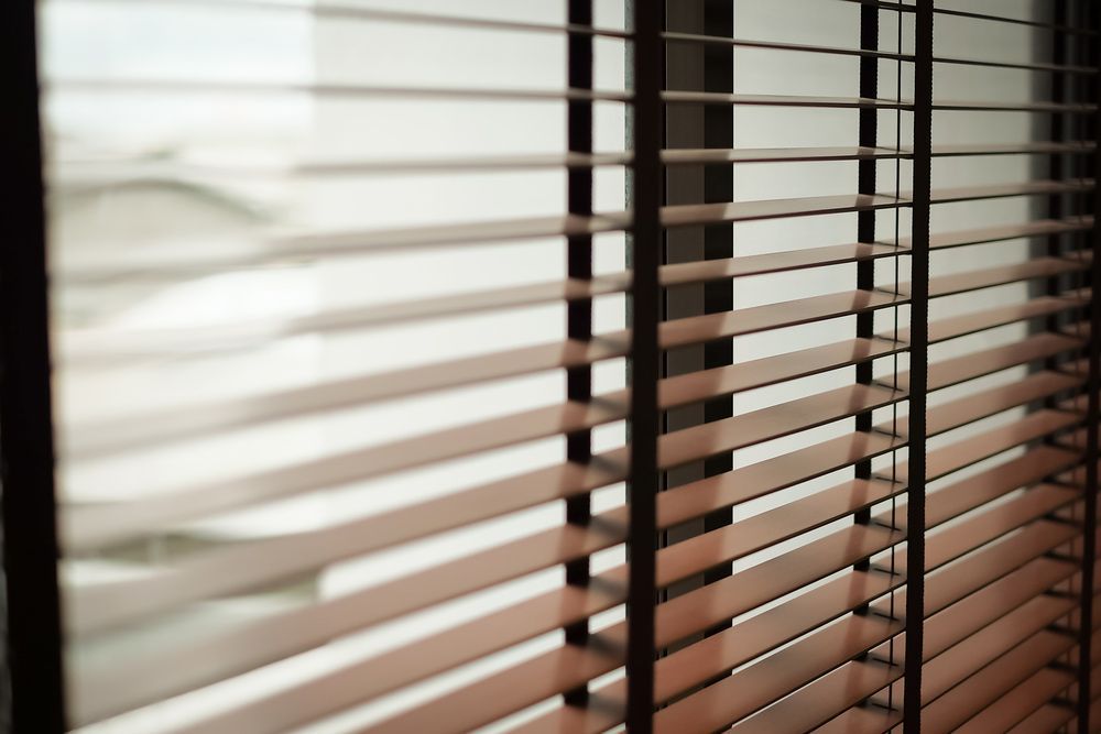 A Close Up of a Window With Blinds on It — Artizen Curtains in Coolum, QLD
