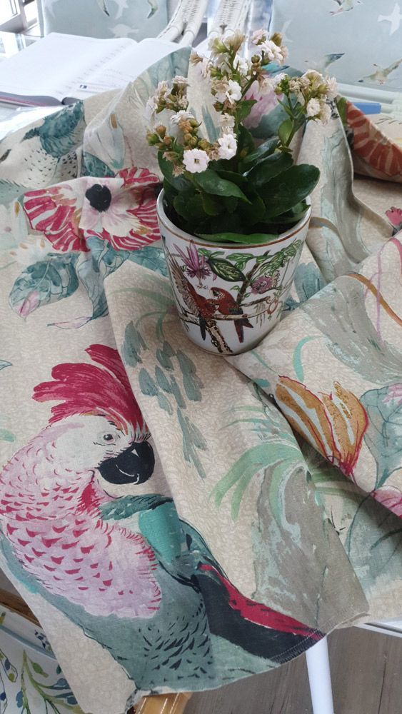 A Potted Plant Is Sitting on Top of A Table Cloth with Birds on It — Artizen Curtains in Palmwoods, QLD